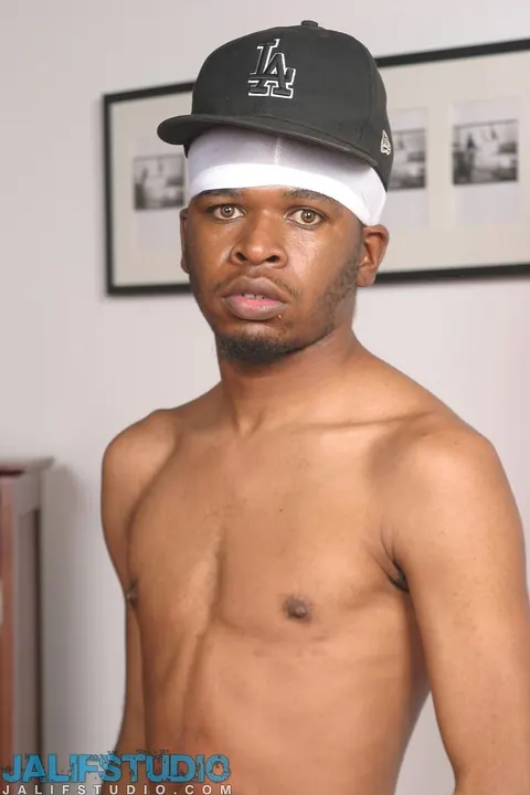 Hairy Black Man Strips Nude and Shows His Huge Cock – photo 10 of 21