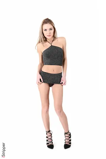 Skinny Blonde Strips Out of Her Skirt and Panties in Heels