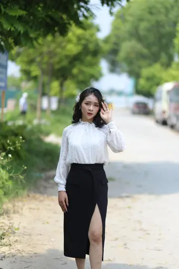 Asian Brunette Shows Her Legs and Ass Outdoors