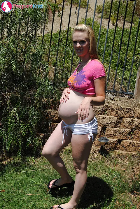 Pregnant Babe Shows Off Her Big Tits and Bump Outside – photo 8 of 15
