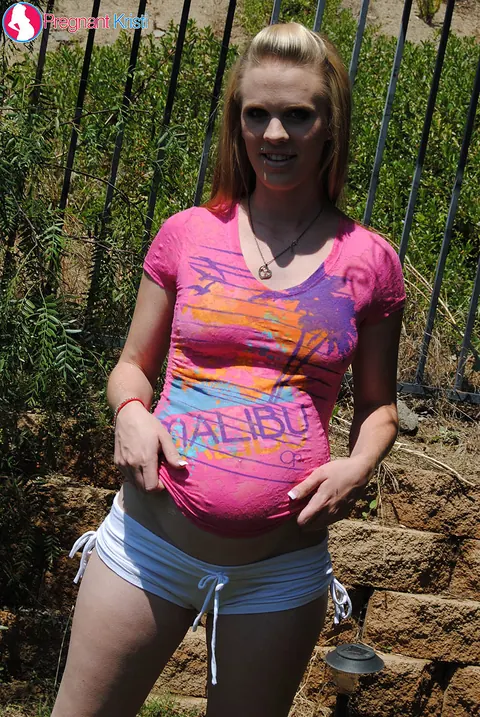Pregnant Babe Shows Off Her Big Tits and Bump Outside – photo 7 of 15