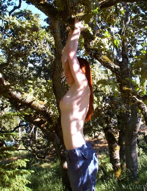 Woman Gives a Blowjob in the Forest – photo 20 of 21