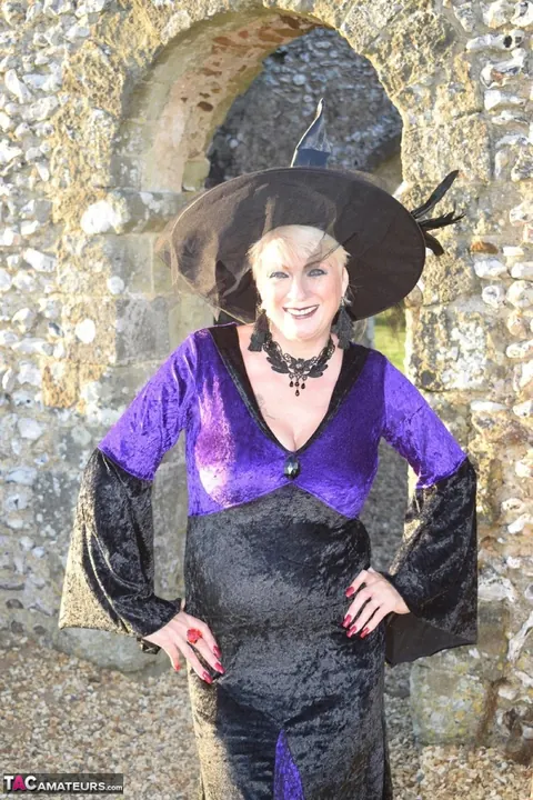 Short-Haired Blonde in Costume Lingerie Spreads Outdoors – photo 7 of 16