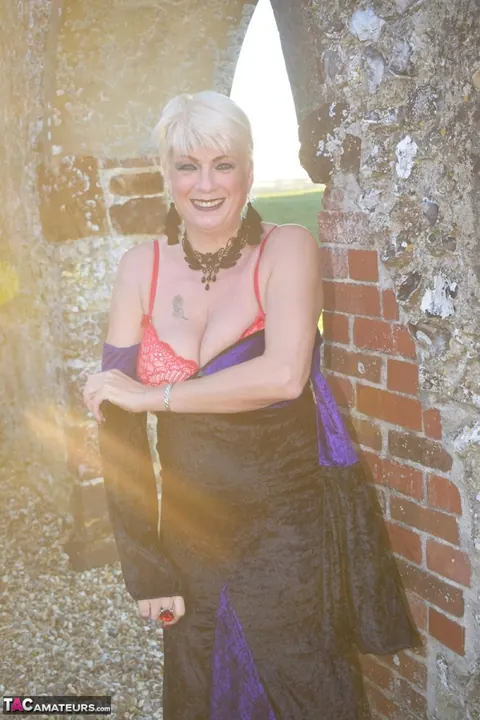 Short-Haired Blonde in Costume Lingerie Spreads Outdoors – photo 15 of 16