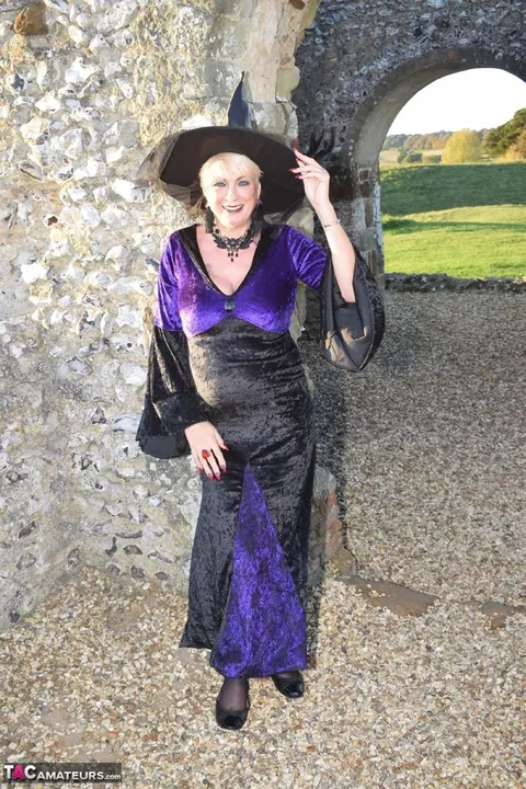 Short-Haired Blonde in Costume Lingerie Spreads Outdoors – photo 4 of 16