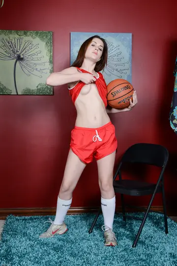 Petite Brunette with Small Enhanced Tits Spreads Her Legs