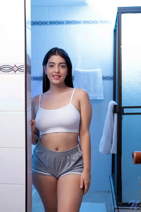 Latina with Big Tits Strips Out of Her Shorts – photo 1 of 20