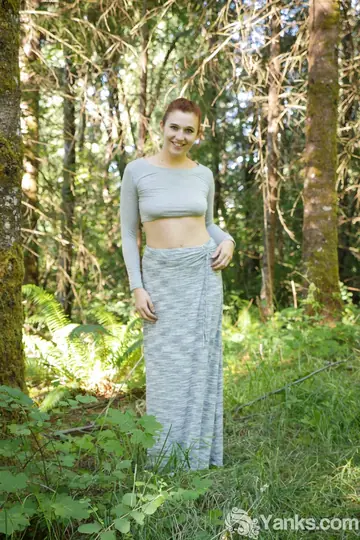 Pale Redhead Stands Naked and Fingers Her Pussy in a Forest