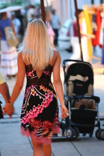 Woman in a Bikini and Skirt Flashes Publicly at the Beach