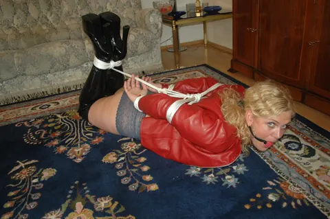 Blonde in Leather Lingerie Gets Bound and Ball Gagged – photo 13 of 16