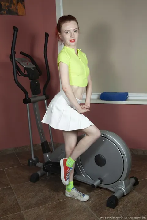 Eva Strawberry: Pale Redhead MILF Spreads Her Hairy Pussy in the Gym – photo 3 of 16
