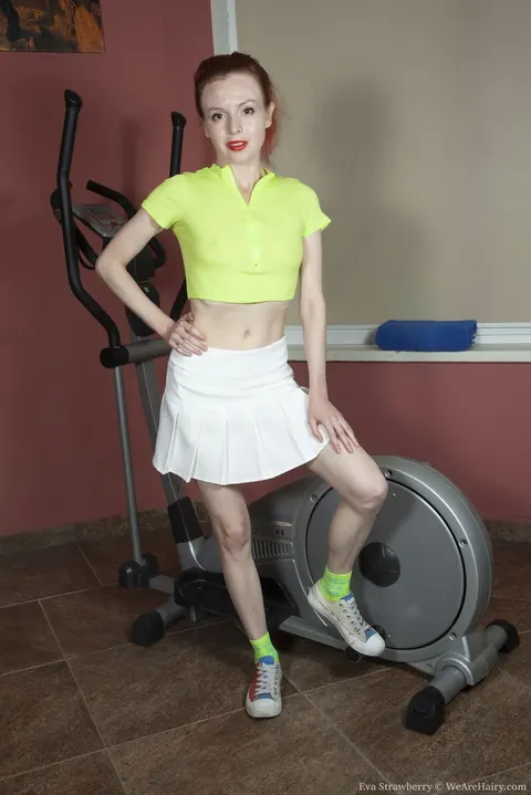 Eva Strawberry: Pale Redhead MILF Spreads Her Hairy Pussy in the Gym – photo 1 of 16