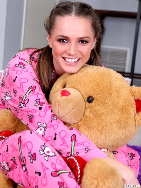 Tori Black: Thick Brunette in Pigtails Strips Off Her Panties in the Bedroom – photo 2 of 15