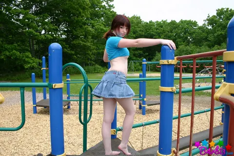 B4rbi3: Redhead in Pigtails Flashes Her Tits Outdoors in a Skirt – photo 5 of 12