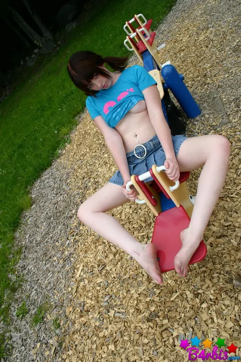B4rbi3: Redhead in Pigtails Flashes Her Tits Outdoors in a Skirt – photo 10 of 12