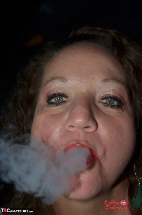 Debbie Delicious: Thick Mature Brunette Smokes in Leather Before Fingering – photo 3 of 20