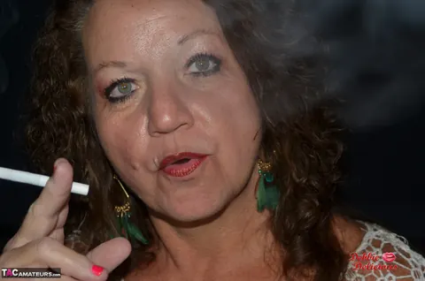 Debbie Delicious: Thick Mature Brunette Smokes in Leather Before Fingering – photo 8 of 20