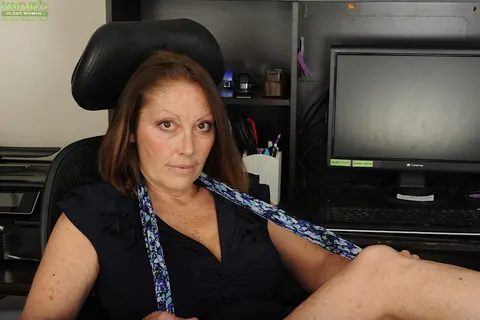 Jane McWilliams: Thick Brunette MILF Strips Out of Her Skirt in the Office – photo 2 of 16