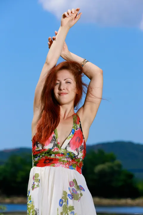 Redhead Lifts Her Skirt and Spreads Her Pussy Outdoors – photo 1 of 20