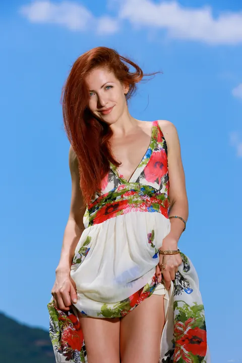 Redhead Lifts Her Skirt and Spreads Her Pussy Outdoors – photo 2 of 20