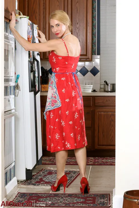 Slim Blonde MILF Strips and Fingers Her Pussy in the Kitchen – photo 1 of 21