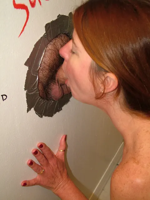 Dee Delmar: Mature Redhead Sucks Cock at Gloryhole and Takes a Facial – photo 5 of 20