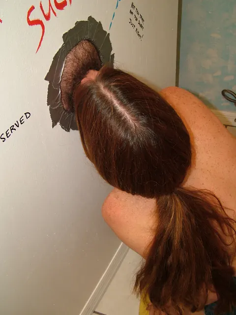 Dee Delmar: Mature Redhead Sucks Cock at Gloryhole and Takes a Facial – photo 3 of 20