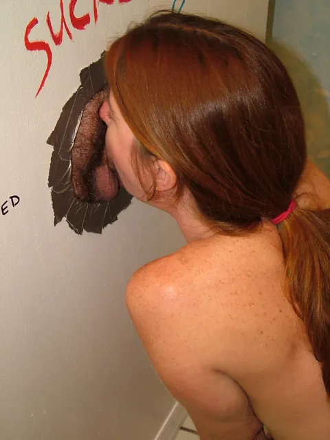 Dee Delmar: Mature Redhead Sucks Cock at Gloryhole and Takes a Facial – photo 4 of 20