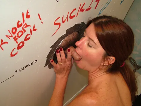 Dee Delmar: Mature Redhead Sucks Cock at Gloryhole and Takes a Facial – photo 6 of 20