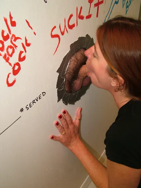 Dee Delmar: Mature Redhead Sucks Cock at Gloryhole and Takes a Facial – photo 2 of 20