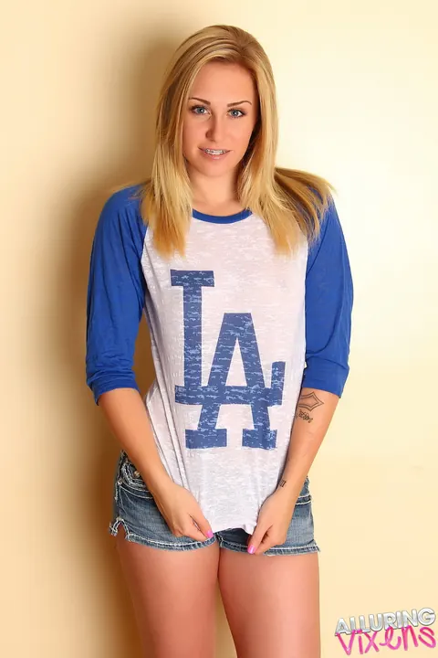 Ashley Vallone: Thick Blonde in Denim Shorts Covers Her Tits and Shows Her Ass – photo 1 of 12