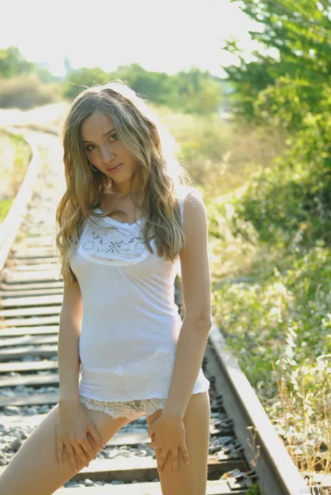 Vita C: Hairy Latina Blonde Spreads and Shows Her Feet on Rail Tracks – photo 1 of 18