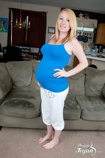 Pregnant Blonde Strips Out of Her Panties and Spreads