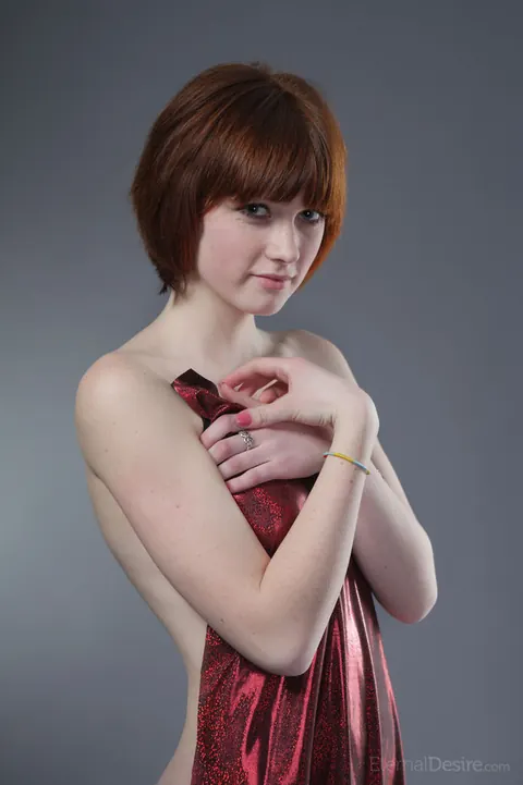 Slim European Redhead Spreads Her Shaved Pussy on a Studio Chair – photo 11 of 16