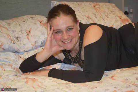Mature BBW in Stockings Shows Her Big Tits on the Bed – photo 1 of 16