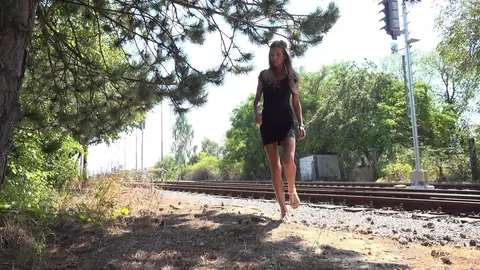 Sarah Key: Tall Skinny Redhead Peeing Against a Tree Outdoors – photo 1 of 15