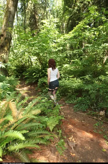 Dirty Angie – Redhead MILF Strips Out of Her Lingerie and Shorts in the Forest