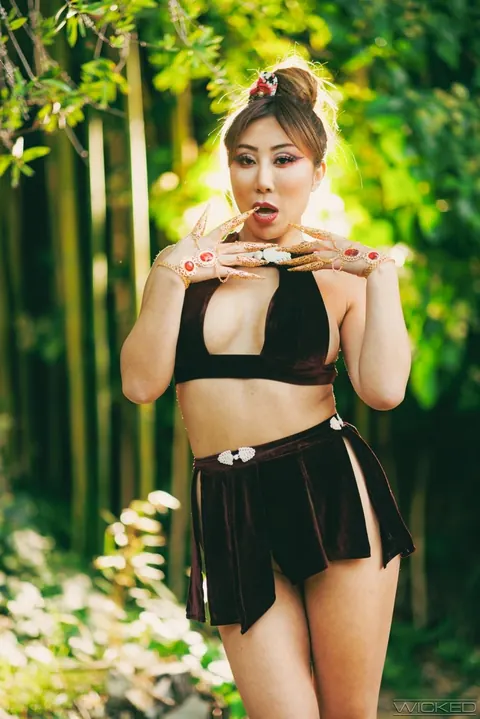 Nicole Doshi: Asian Babe with Big Tits Gives a Blowjob Outdoors – photo 8 of 20