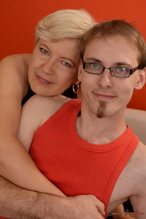 Ursula Grande: Short-Haired Mature Blonde in Glasses Rides Her Boy Toy – photo 2 of 17