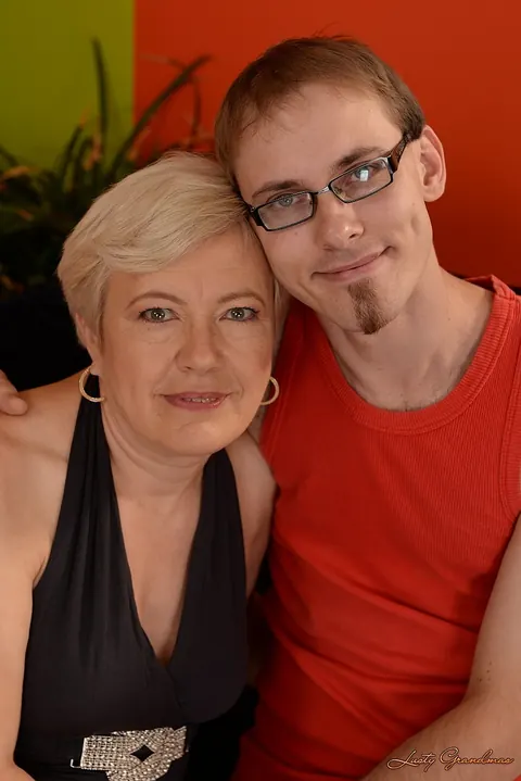 Ursula Grande: Short-Haired Mature Blonde in Glasses Rides Her Boy Toy – photo 1 of 17