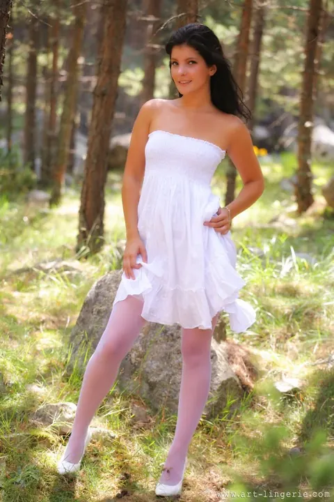 Louise Law: Brunette in Lingerie and Stockings Strips in the Forest – photo 1 of 16