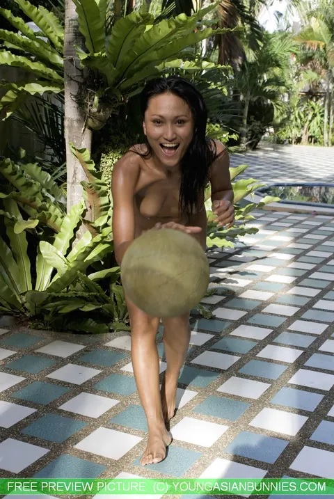 Asian Brunette Drops Her Bikini and Poses Nude in the Garden – photo 13 of 16