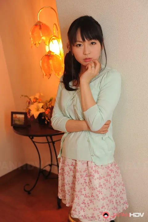 Nozomi Oshima: Slim Japanese MILF Poses in Her Printed Skirt – photo 15 of 15