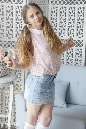 Nastyshka – Redhead in Pigtails Lifts Her Skirt and Spreads Her Pussy