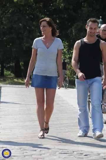 Mature Woman in Glasses Takes Group Sex Outdoors