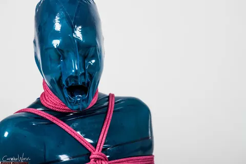 Brunette Restrained in Latex with Pink Rope – photo 10 of 16