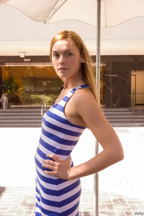 Bailey Rayne: Blonde in a Striped Dress Flashes Her Ass Outdoors by the Car – photo 8 of 11
