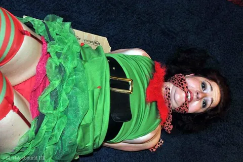 Redhead in Christmas Costume and Panties Is Bound and Gagged – photo 5 of 16