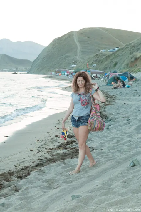Brunette MILF Exposes Her Hairy Pussy on the Beach – photo 2 of 17