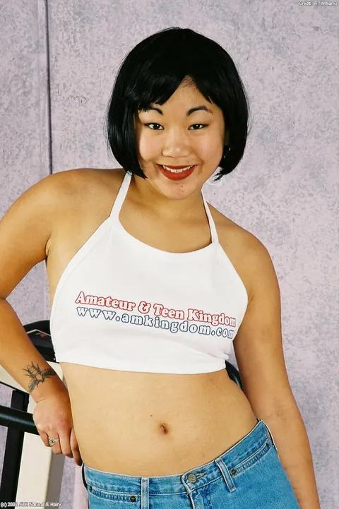 Asian Brunette Strips Nude and Spreads Her Hairy Bush – photo 1 of 16